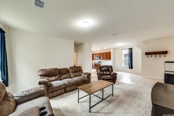 a living room with furniture and a couch