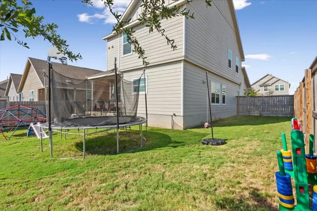 a view of backyard with a garden and plants