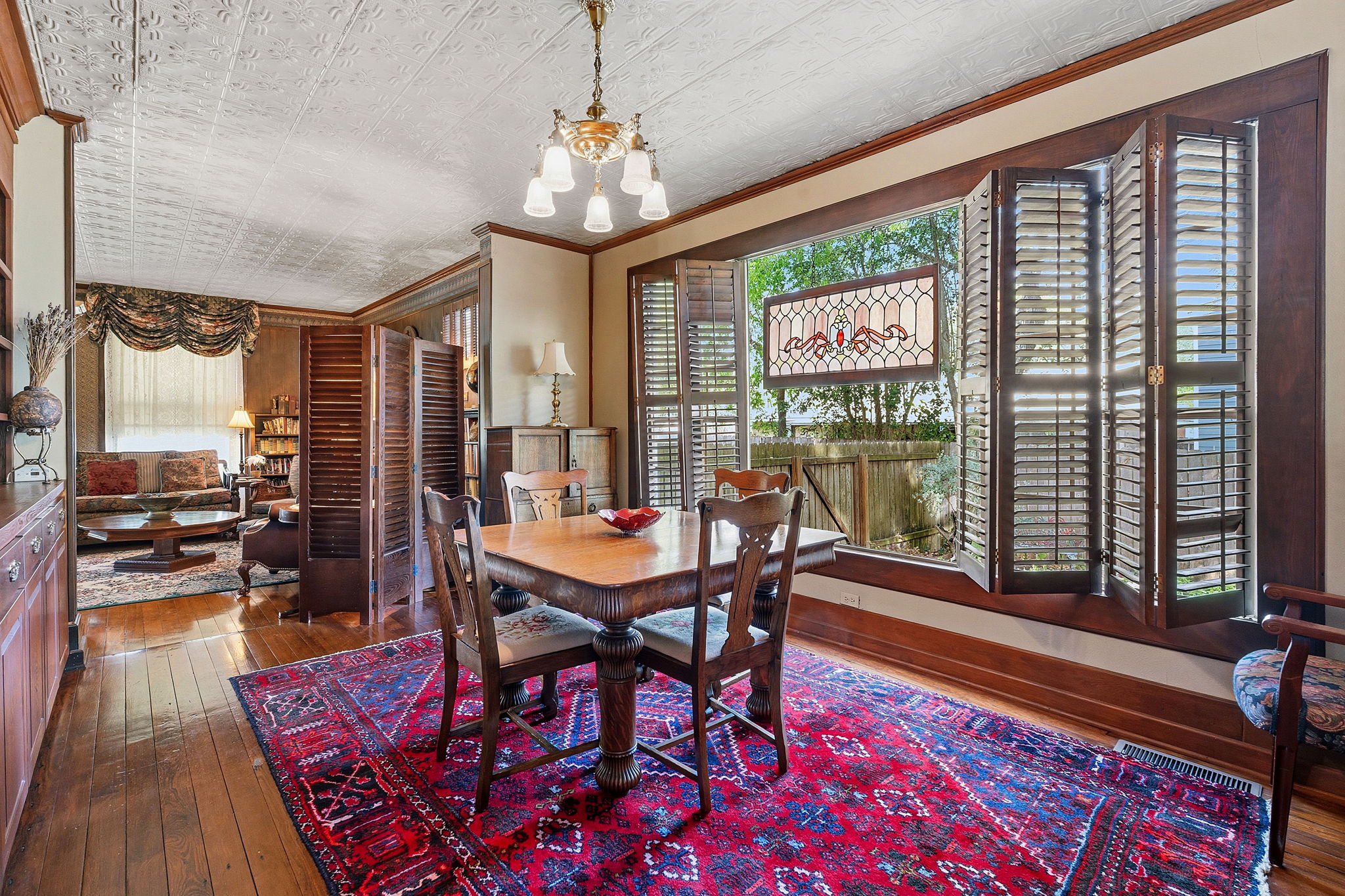 410 Cibilo Street Lockhart, TX 78644 - Photo 25 of 36 a view of a dining room with furniture window and wooden floor