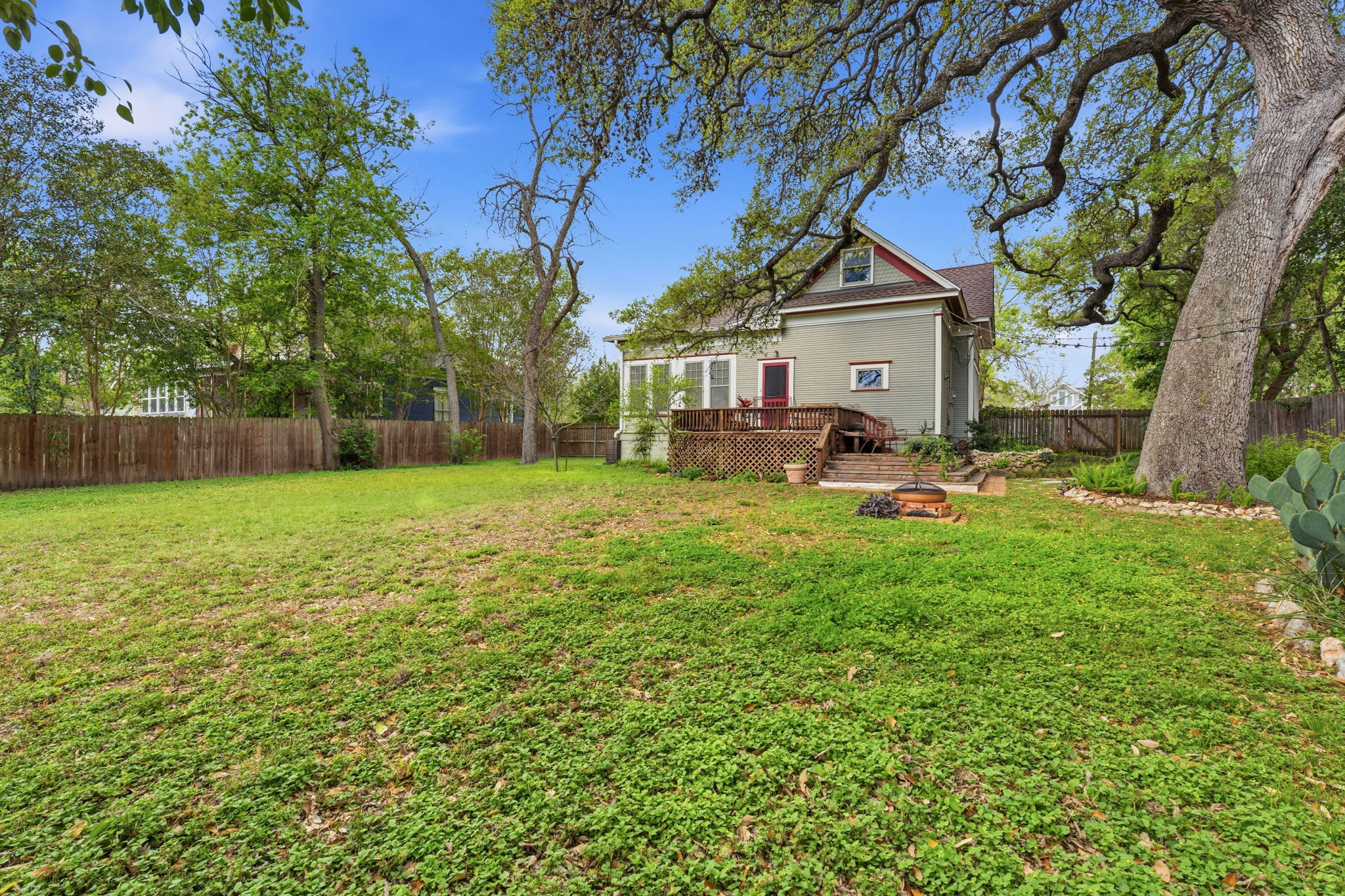410 Cibilo Street Lockhart, TX 78644 - Photo 27 of 36 a view of a house with backyard and sitting area