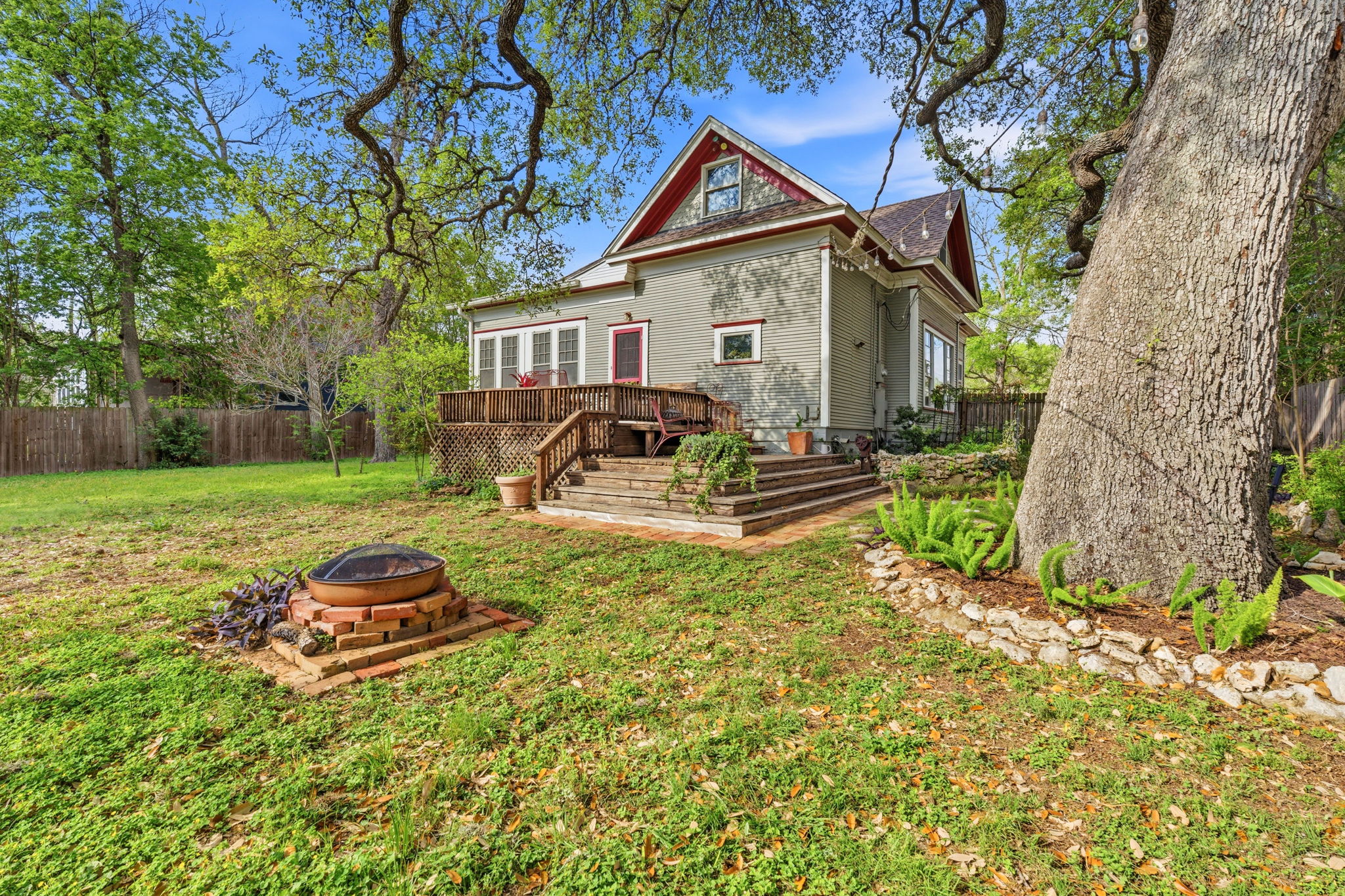 410 Cibilo Street Lockhart, TX 78644 - Photo 28 of 36 a front view of a house with garden