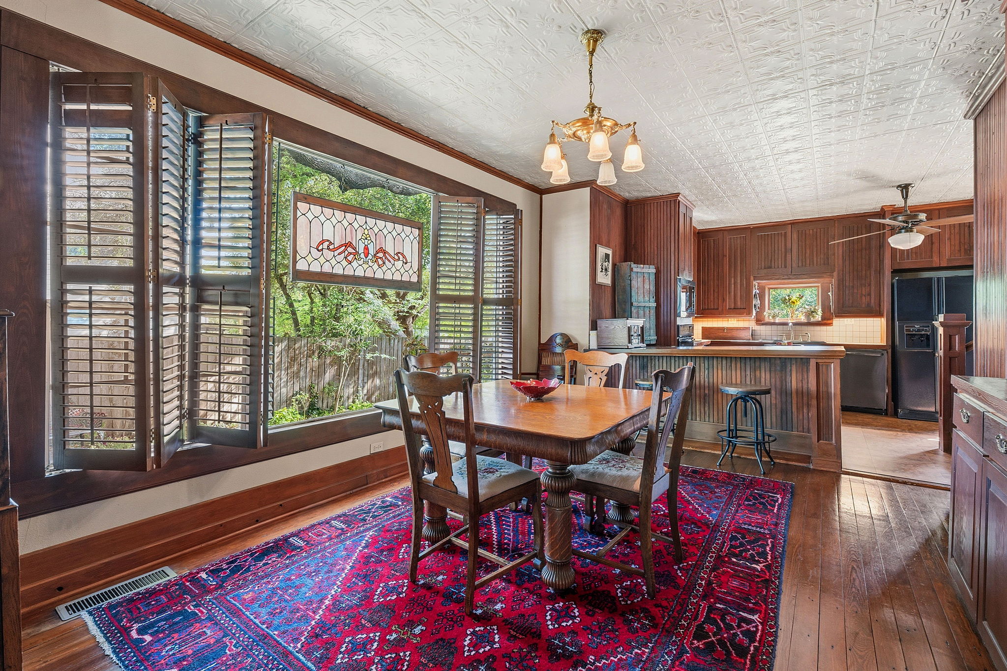 410 Cibilo Street Lockhart, TX 78644 - Photo 4 of 36 a view of a dining room with furniture window and wooden floor