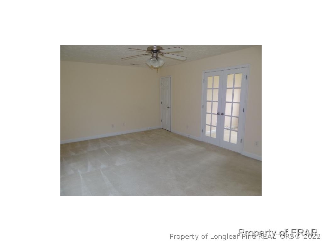 235 Hillandale Road Spring Lake, NC 28390 - Photo 19 of 25 a view of an empty room with windows