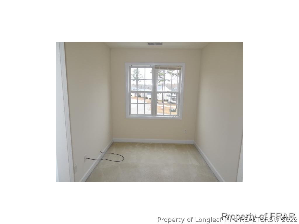 235 Hillandale Road Spring Lake, NC 28390 - Photo 21 of 25 a open space with windows
