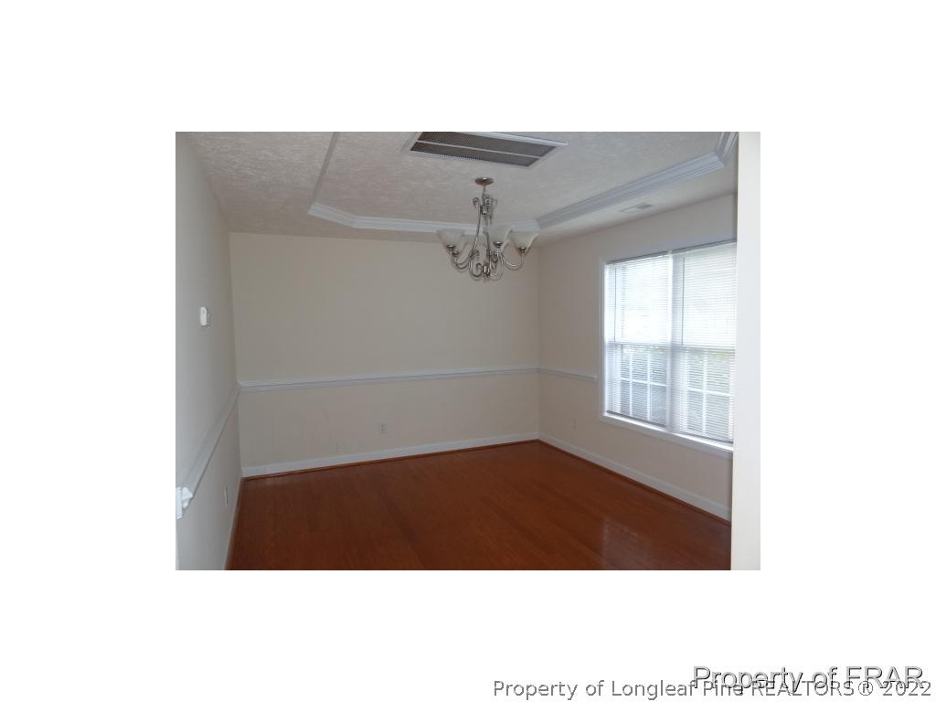 235 Hillandale Road Spring Lake, NC 28390 - Photo 4 of 25 a view of an empty room with a window