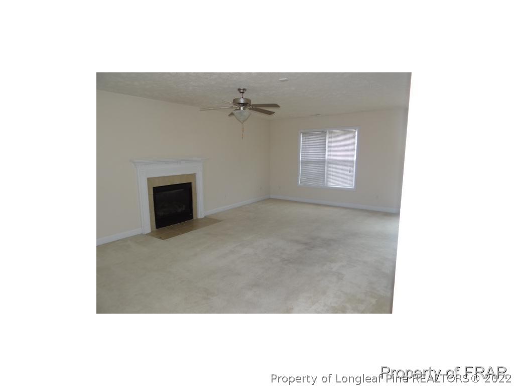 235 Hillandale Road Spring Lake, NC 28390 - Photo 5 of 25 a view of an empty room with a window