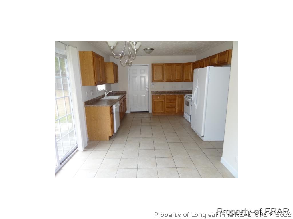 235 Hillandale Road Spring Lake, NC 28390 - Photo 6 of 25 a view of a kitchen with a sink