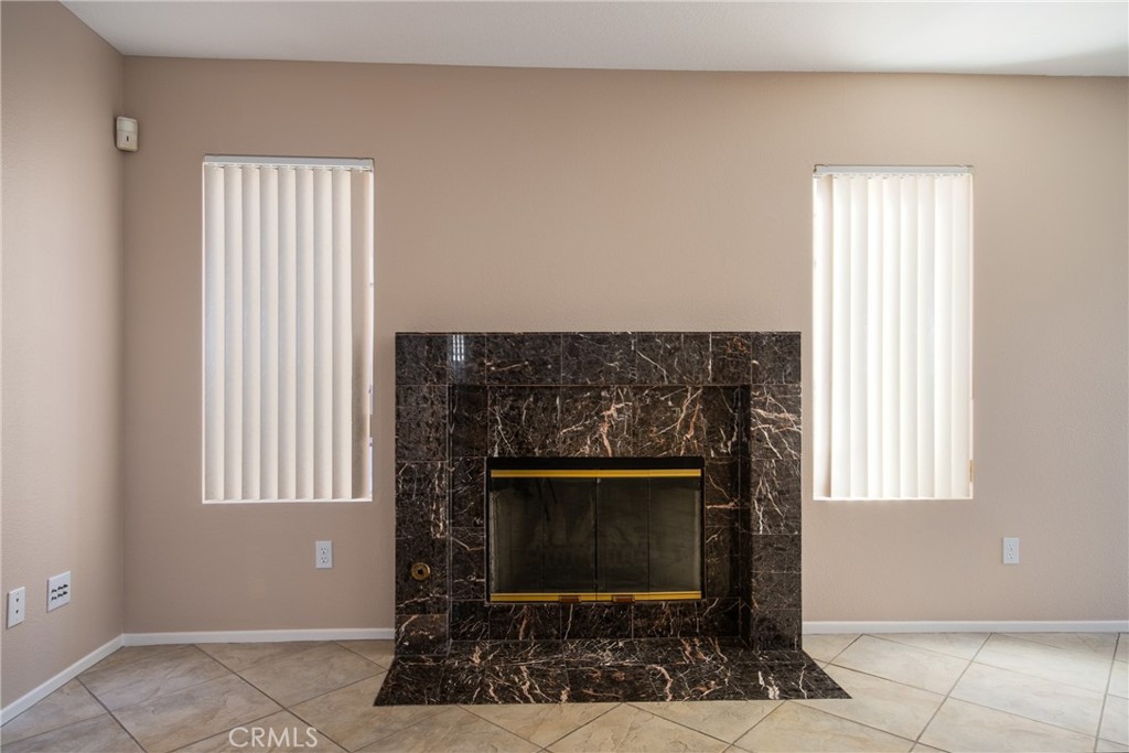 31255 Slate Street Mentone, CA 92359 - Photo 11 of 28 Fireplace in Family Room