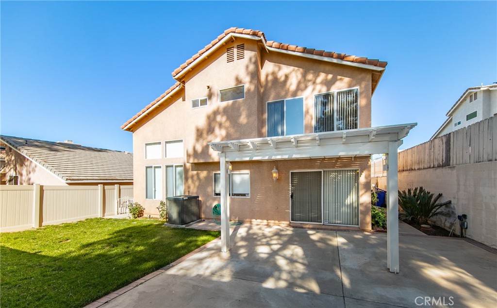 31255 Slate Street Mentone, CA 92359 - Photo 22 of 28 a view of a house with a yard