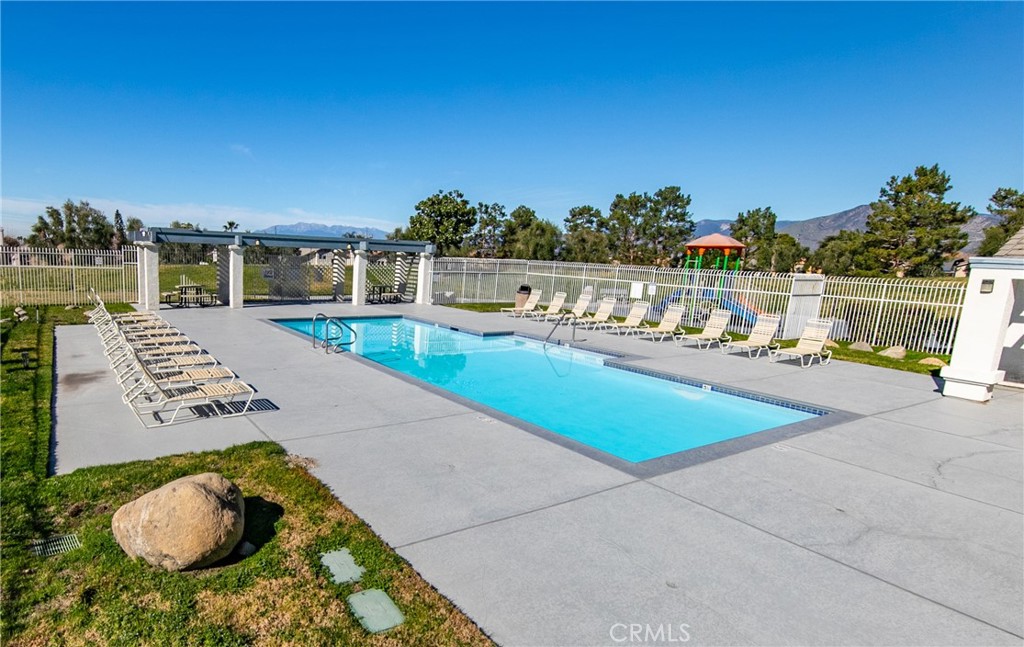 31255 Slate Street Mentone, CA 92359 - Photo 27 of 28 a view of swimming pool with outdoor seating