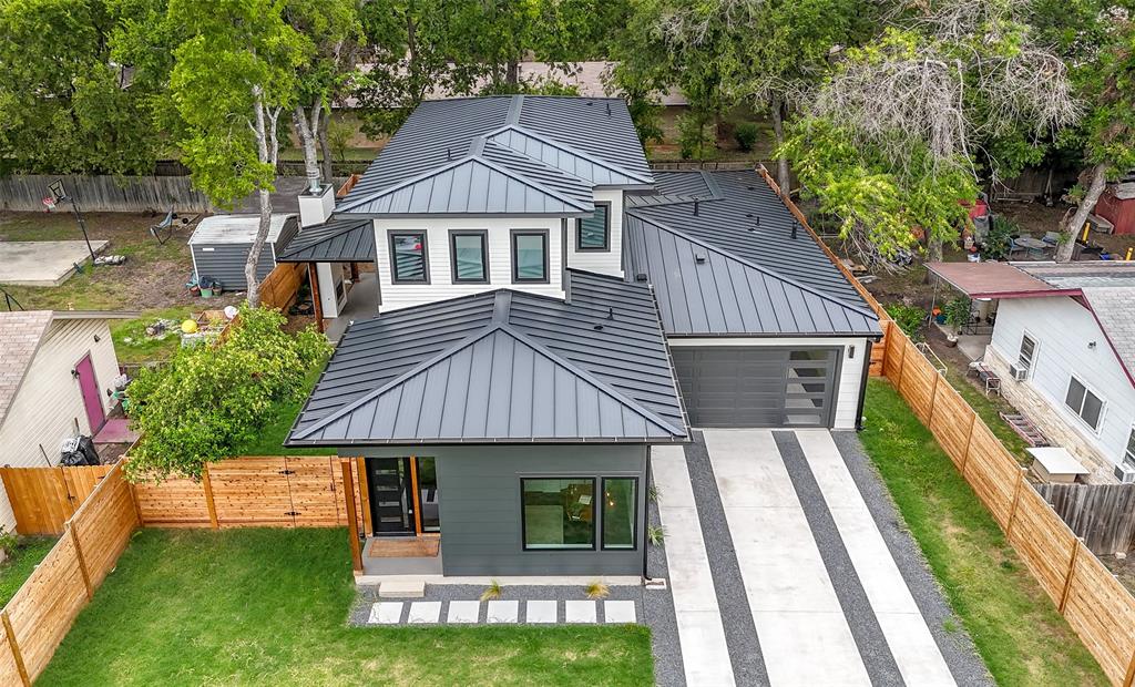6304 Middleham Place Austin, TX 78745 - Photo 1 of 28 a aerial view of a house with a yard