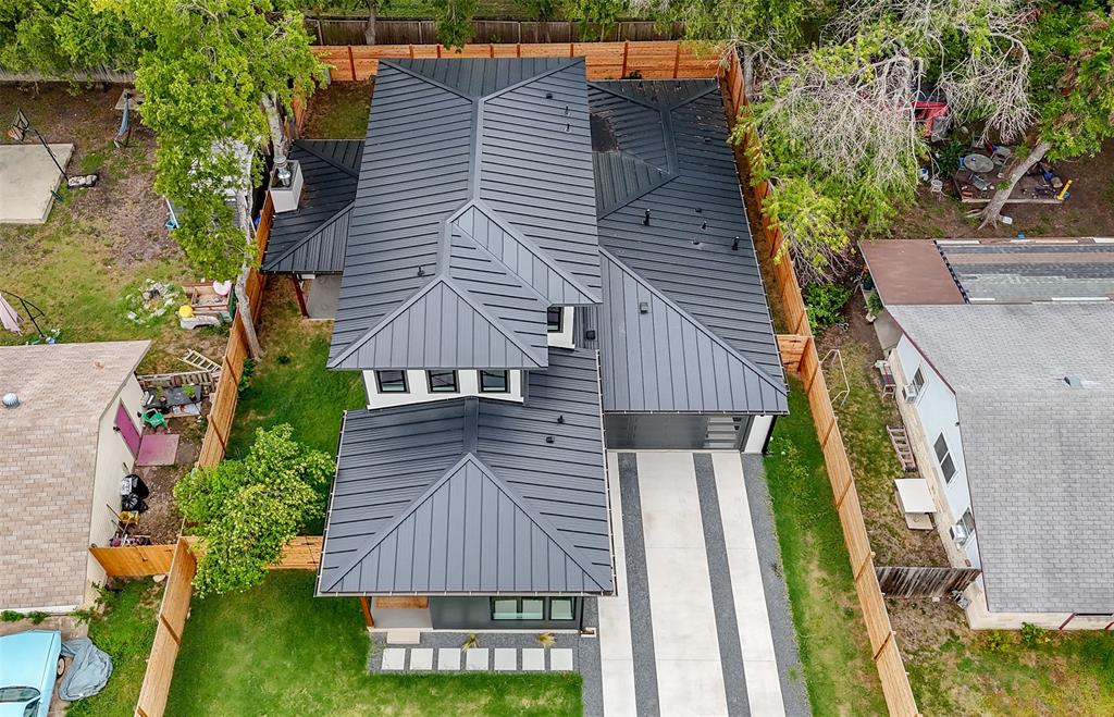 6304 Middleham Place Austin, TX 78745 - Photo 2 of 28 a aerial view of a house with a yard