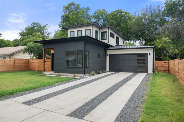a view of a house with a large window