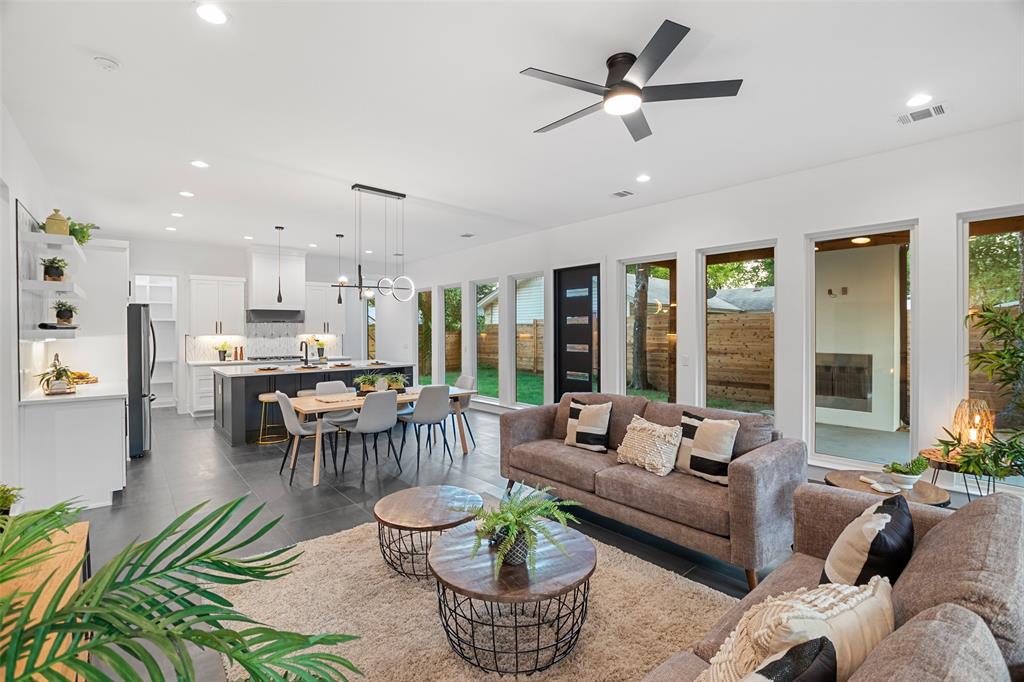 6304 Middleham Place Austin, TX 78745 - Photo 8 of 28 a living room with furniture and a large window