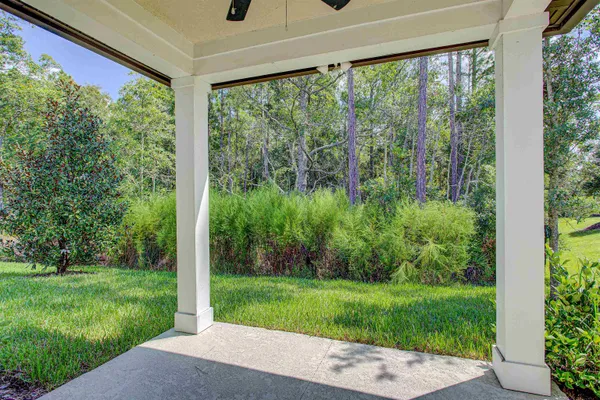 a view of a porch with a yard