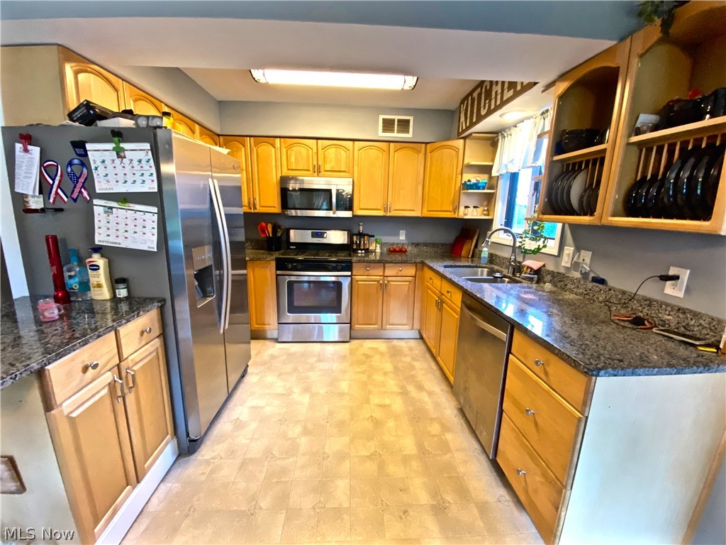1690 Stillwagon Road Niles, OH 44446 - Photo 7 of 27 updated kitchen with granite countertops and stainless steel appliances