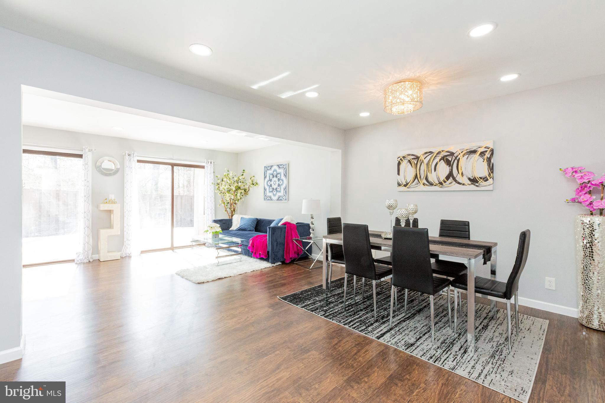 1654 Valencia Way Reston, VA 20190 - Photo 13 of 43 Dining room and family room