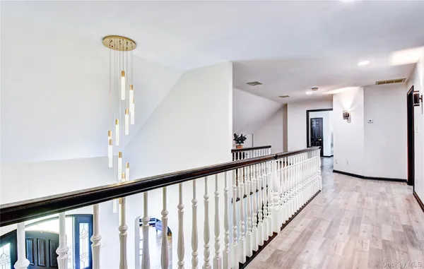 a view of entryway with stairs