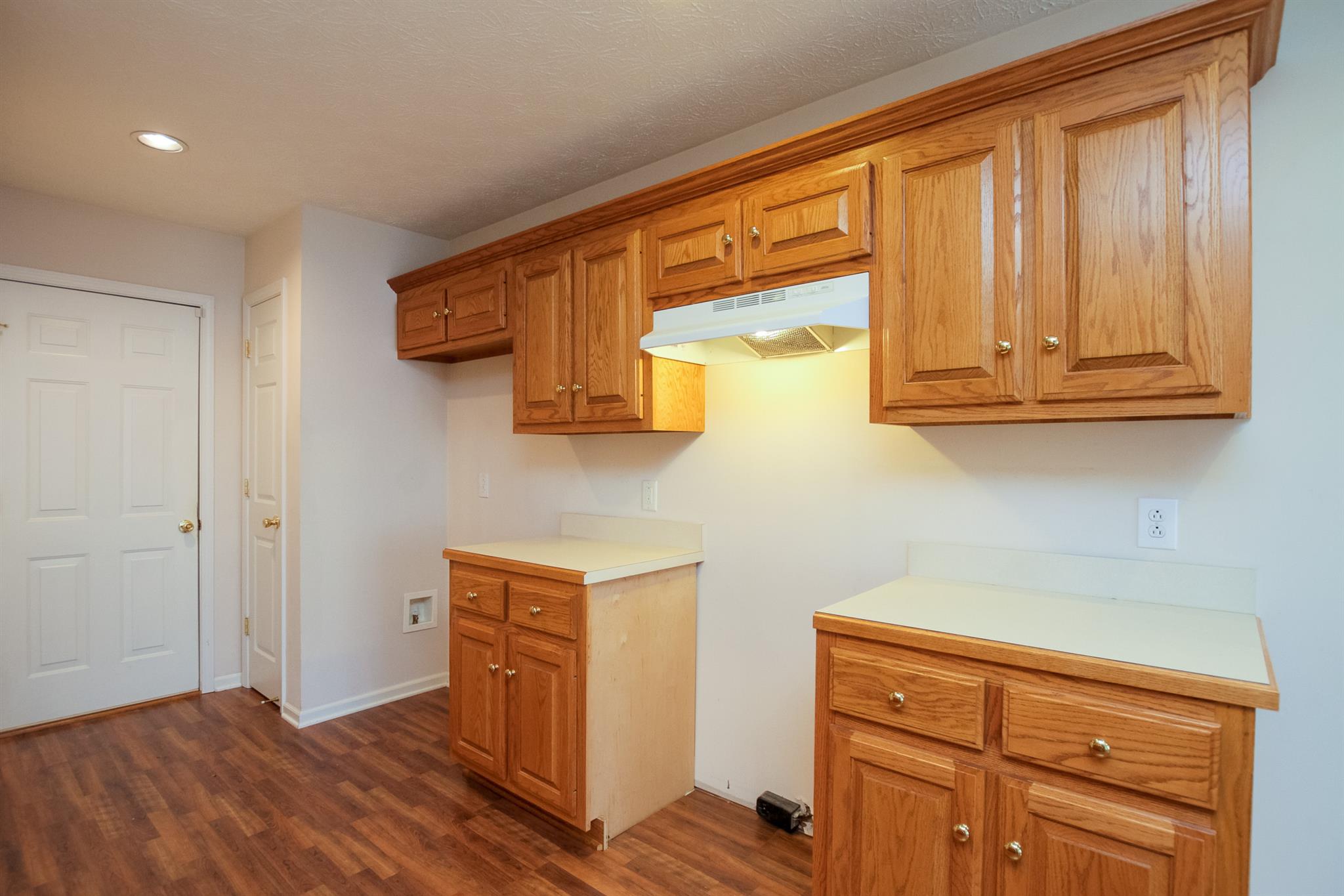 112 Fieldstone Lane Springfield, TN 37172 - Photo 12 of 24 a kitchen with stainless steel appliances granite countertop a refrigerator and cabinets