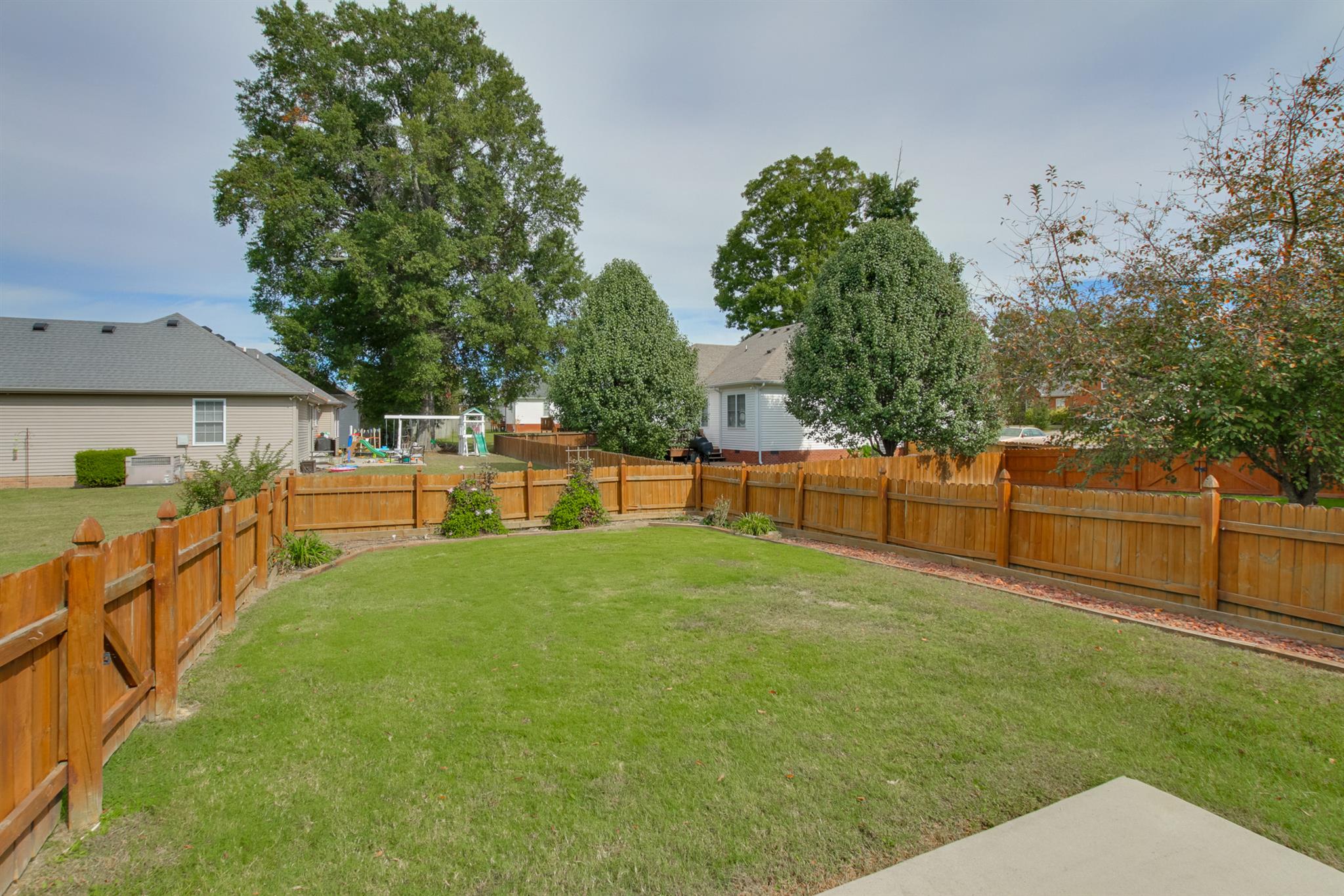 112 Fieldstone Lane Springfield, TN 37172 - Photo 3 of 24 a view of backyard with swimming pool and seating space