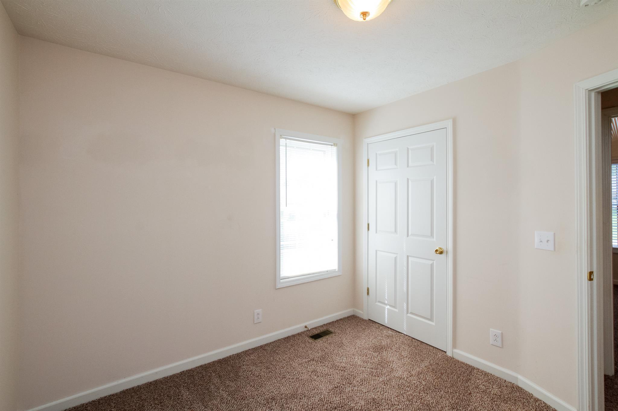 112 Fieldstone Lane Springfield, TN 37172 - Photo 21 of 24 an empty room with windows