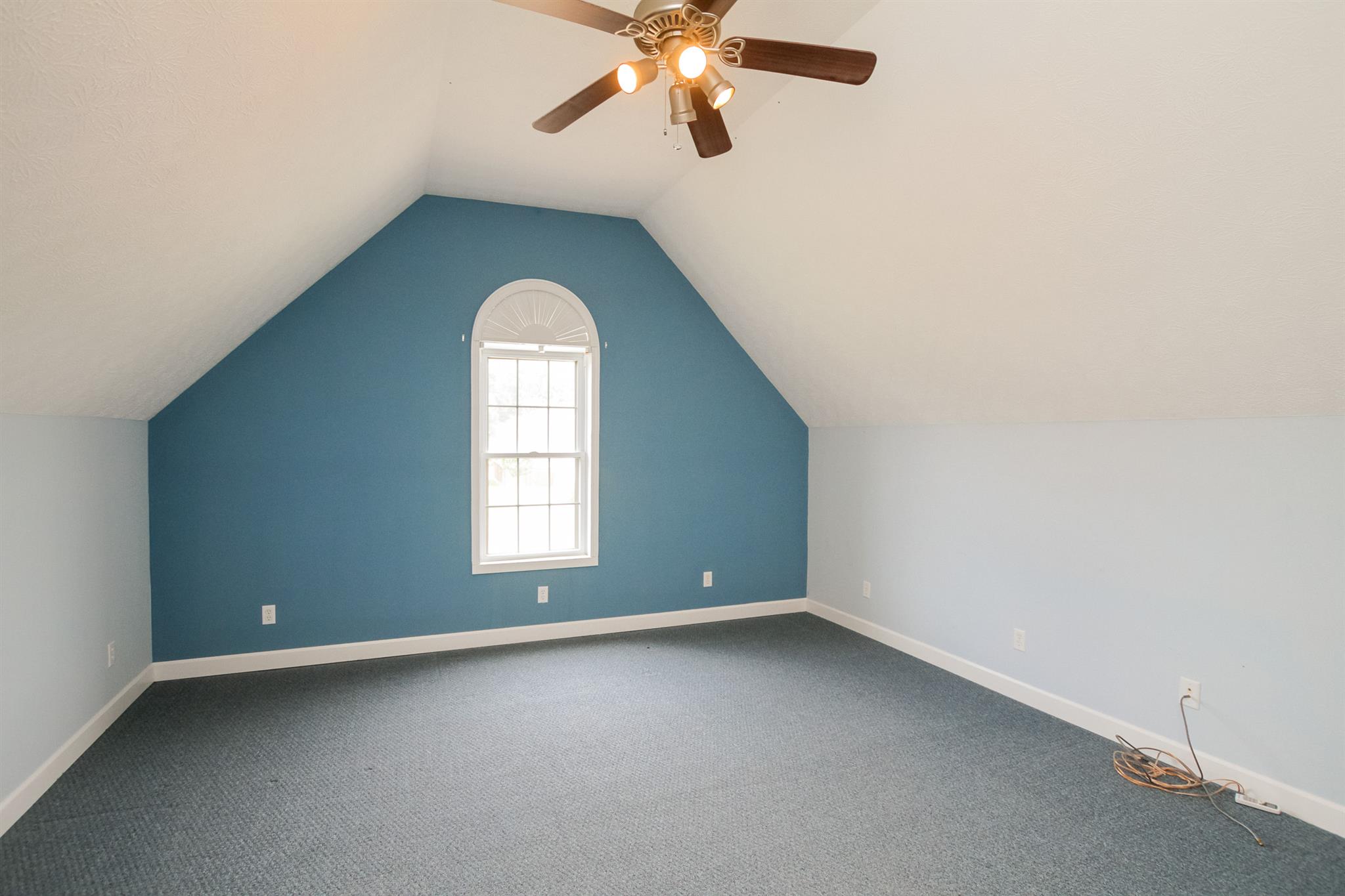 112 Fieldstone Lane Springfield, TN 37172 - Photo 24 of 24 an empty room with a window and a fan