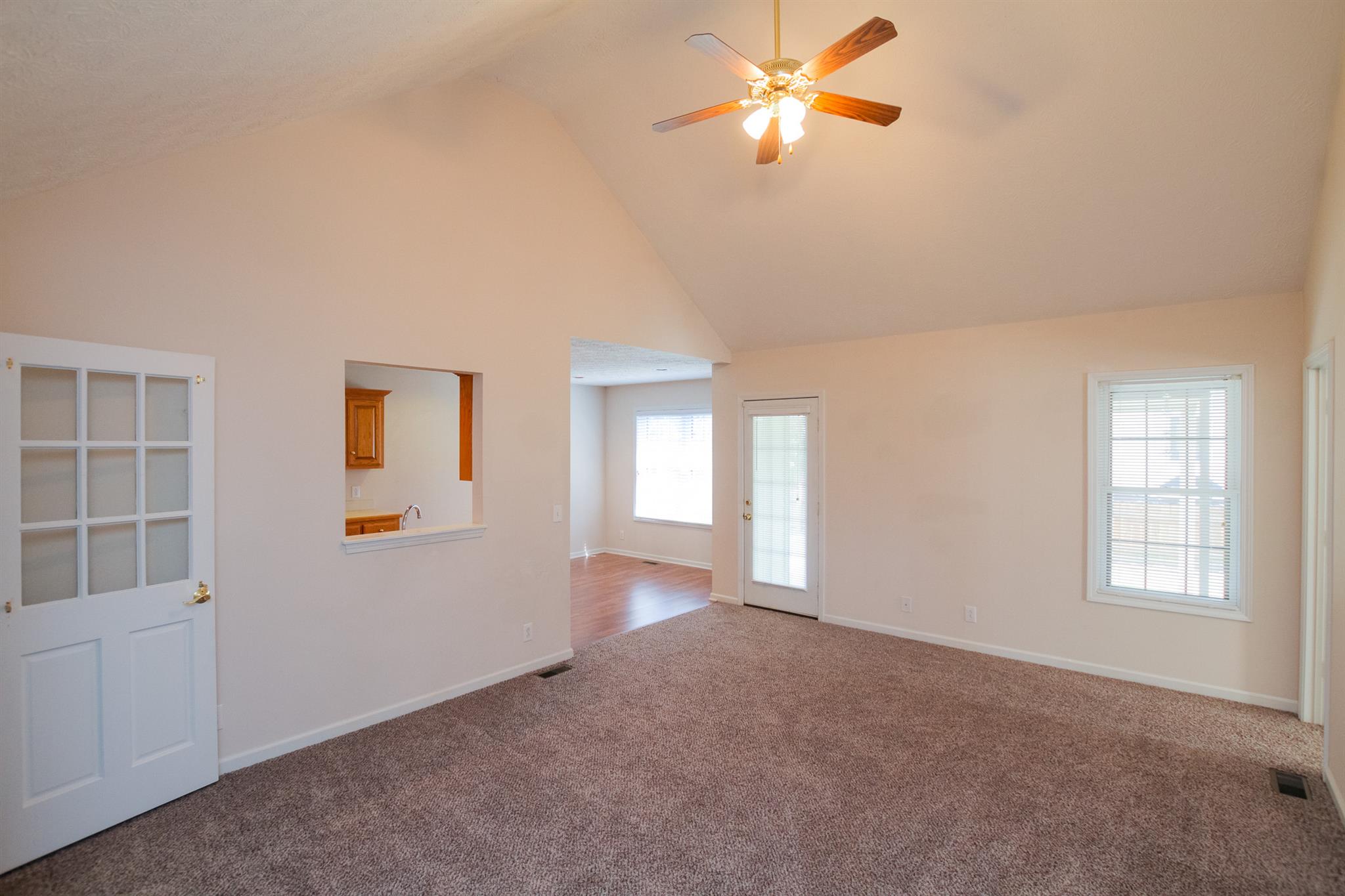 112 Fieldstone Lane Springfield, TN 37172 - Photo 8 of 24 an empty room with windows and fan