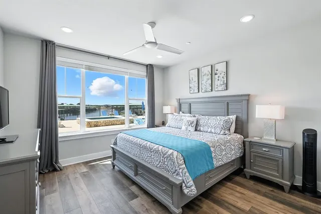 a bathroom with a shower sink and mirror
