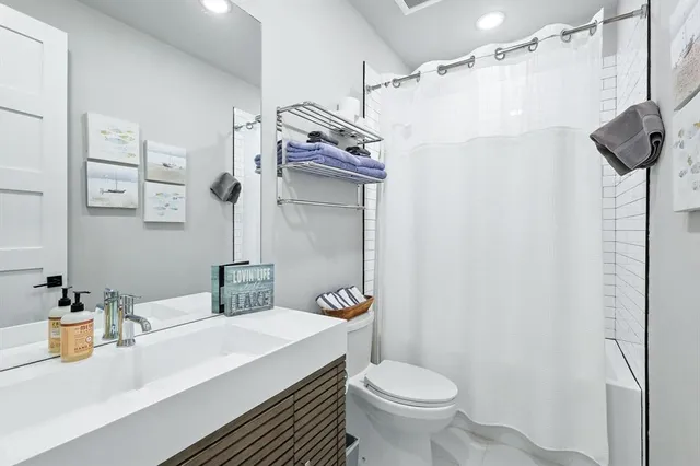 a view of a balcony with furniture