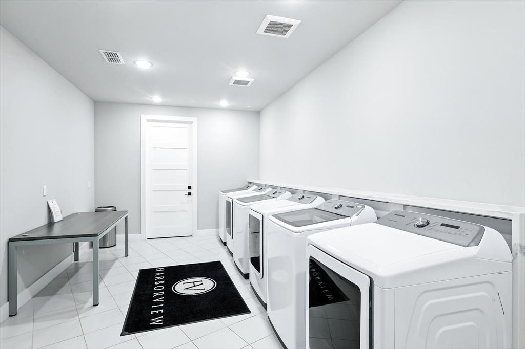 3412 Scenic Point Road, Unit 104 Graford, TX 76449 - Photo 25 of 35 a utility room with dryer and washer