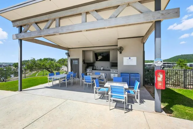 a kitchen with a stove microwave and sink