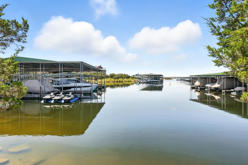 3412 Scenic Point Road, Unit 104 Graford, TX 76449 - Photo 35 of 35 a view of a lake with houses