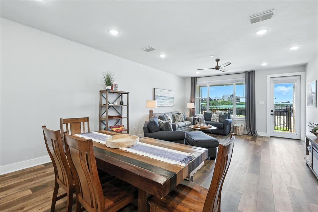 3412 Scenic Point Road, Unit 104 Graford, TX 76449 - Photo 8 of 35 a view of a dining room with furniture window and outside view