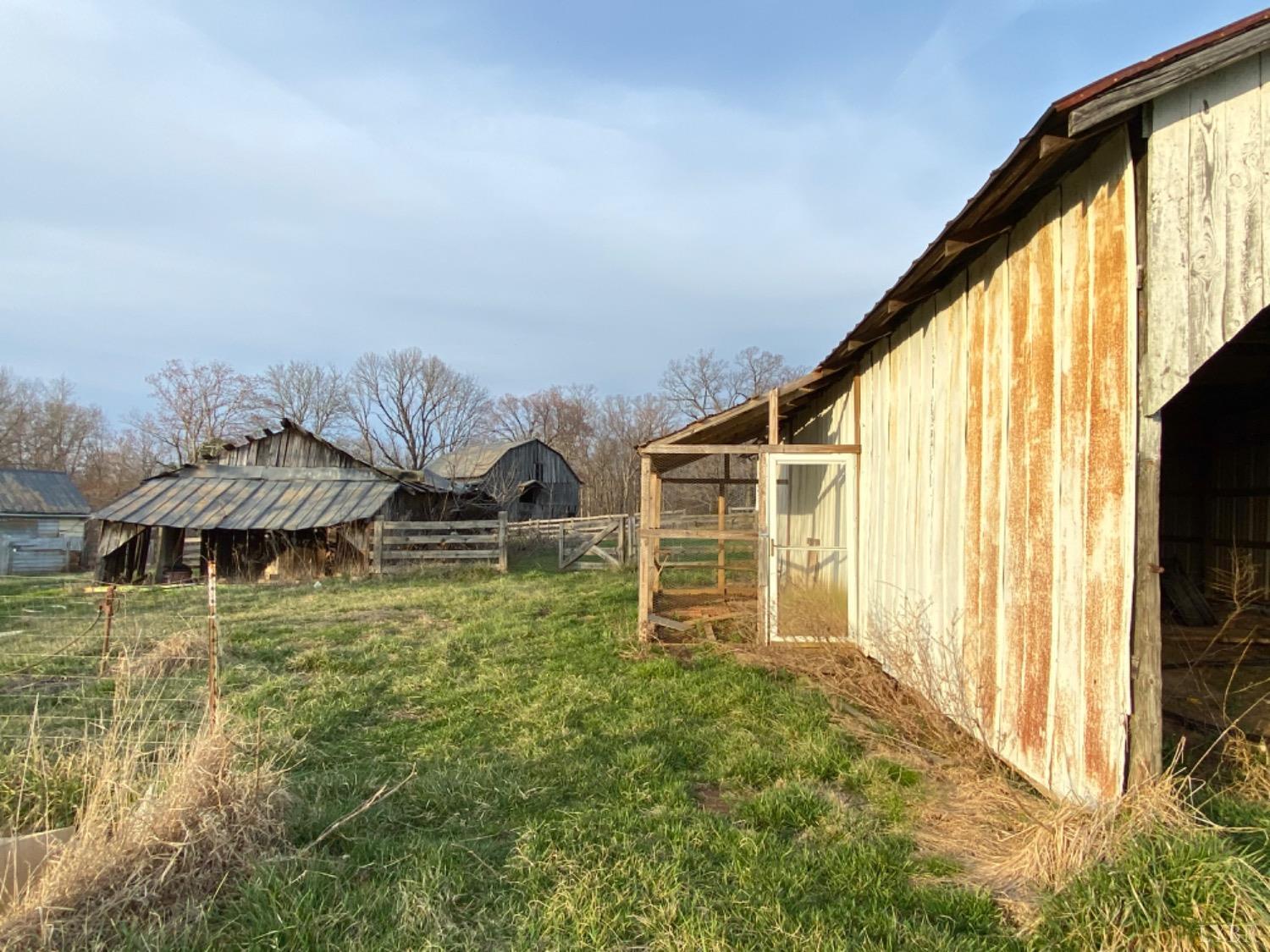 3211 Leesville Road Lynch Station, VA 24571 - Photo 13 of 22 a backyard of a house with lots of green space and fountain