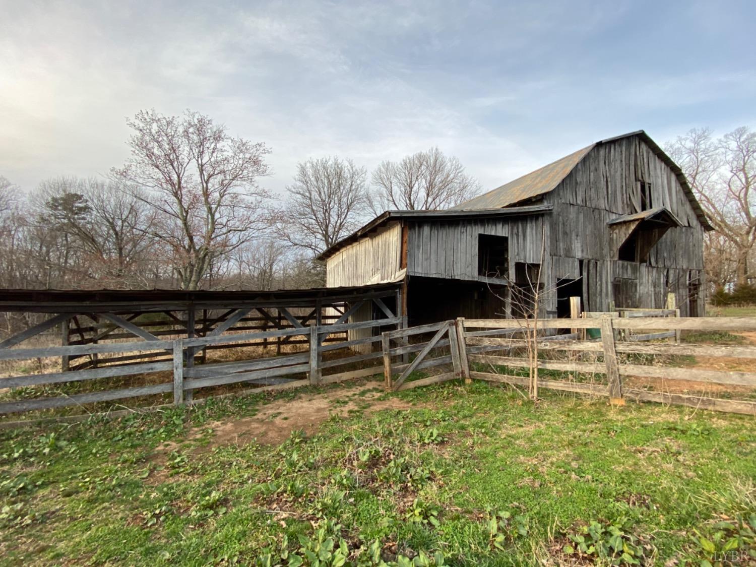 3211 Leesville Road Lynch Station, VA 24571 - Photo 16 of 22 a view of a house with backyard and sitting area