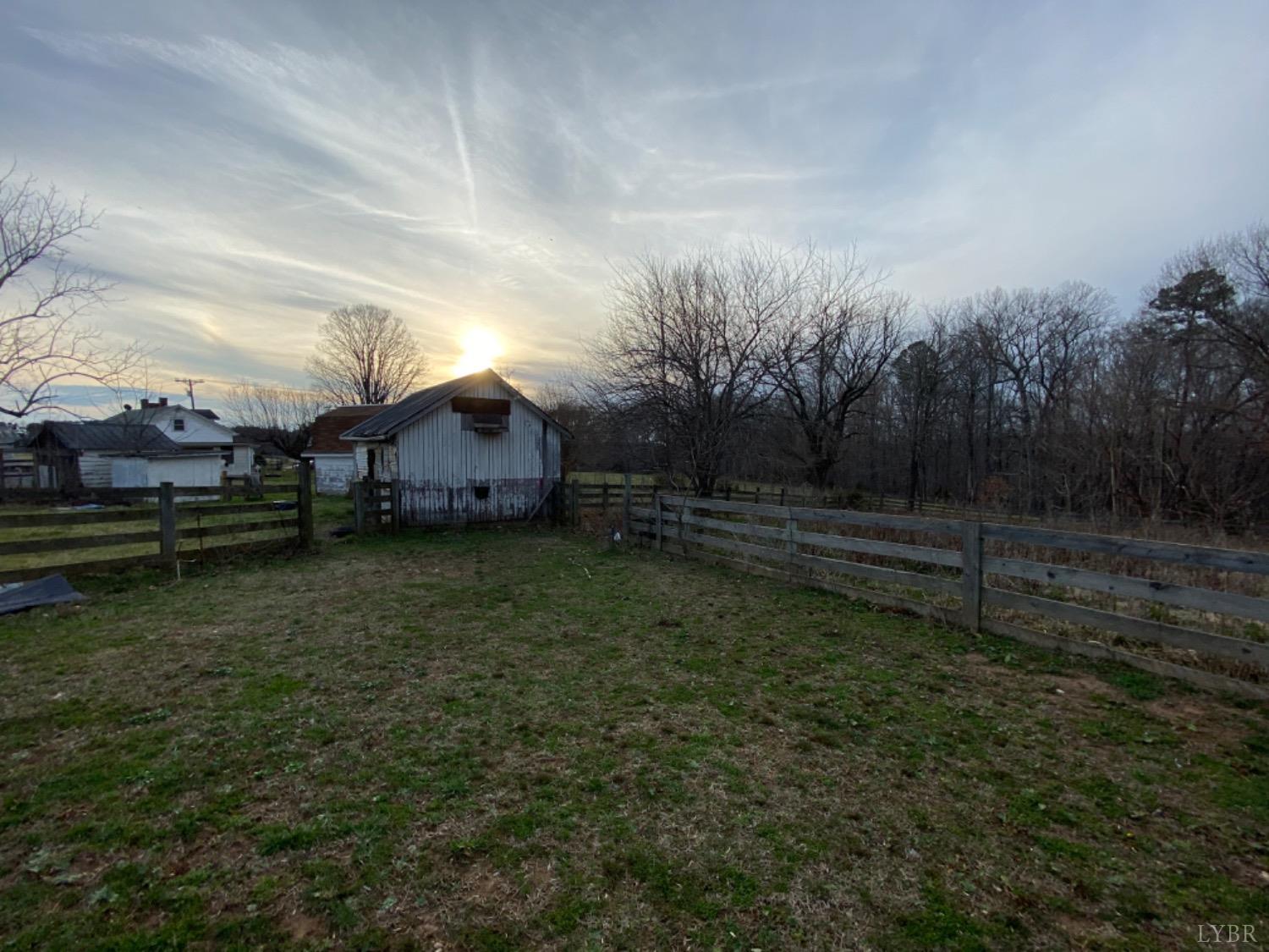 3211 Leesville Road Lynch Station, VA 24571 - Photo 19 of 22 a view of a house with a yard