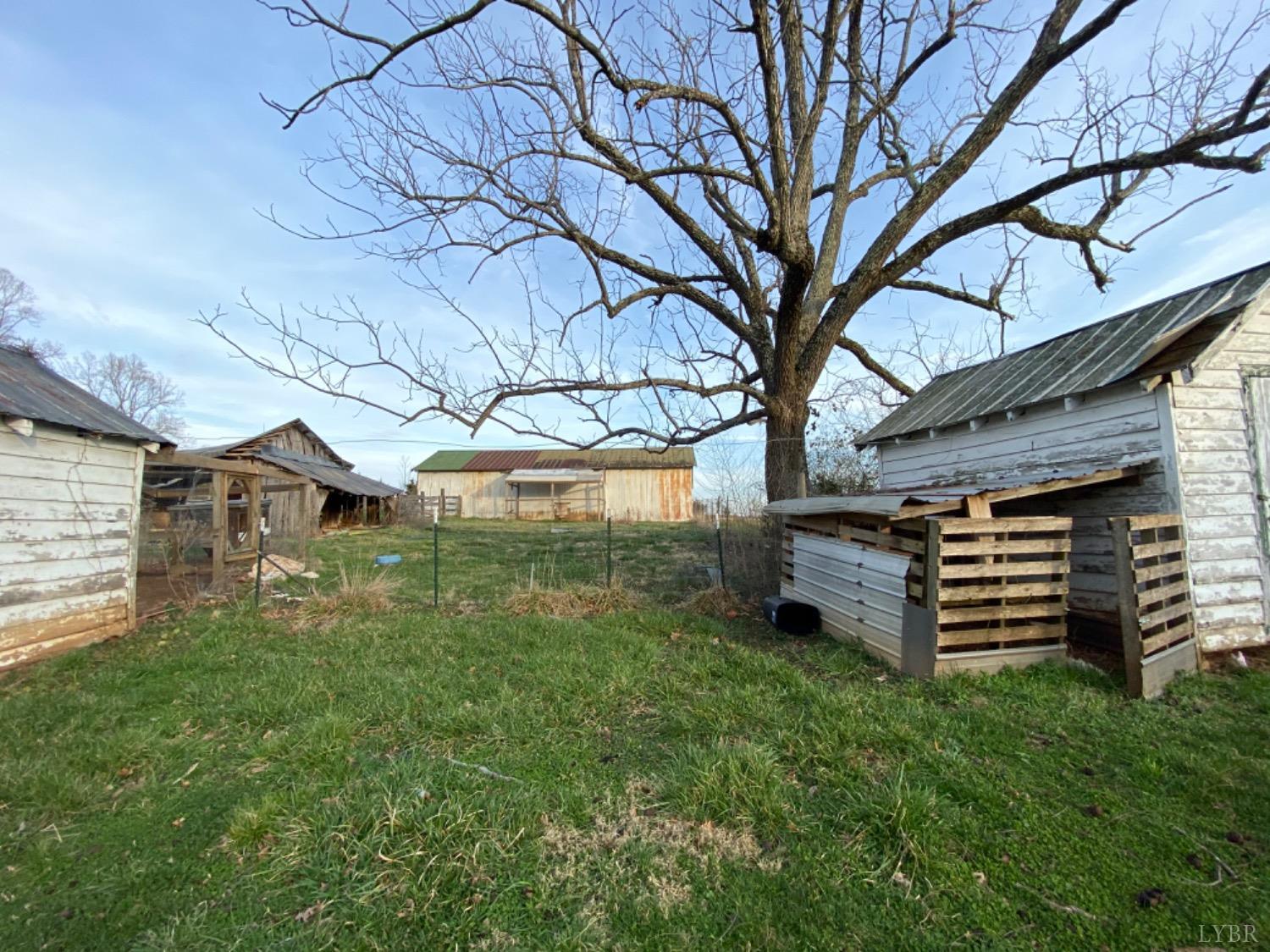3211 Leesville Road Lynch Station, VA 24571 - Photo 7 of 22 a backyard of a house with lots of green space