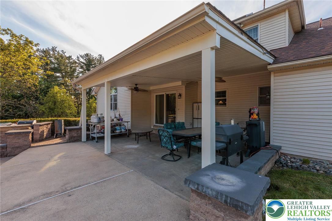 2170 Clearview Road Coplay, PA 18037 - Photo 62 of 75 Enjoy outdoor living on this expansive covered patio, perfect for relaxation and entertaining.