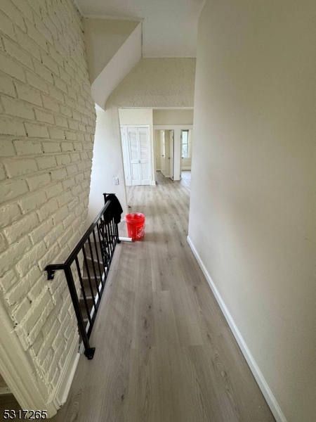 10 Riverside Place Garfield, NJ 07026 - Photo 17 of 26 a view of entryway with wooden floor