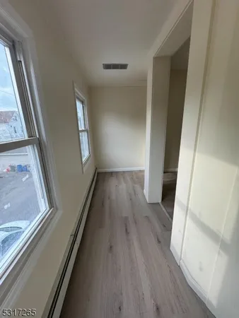 wooden floor in an empty room with wooden floor