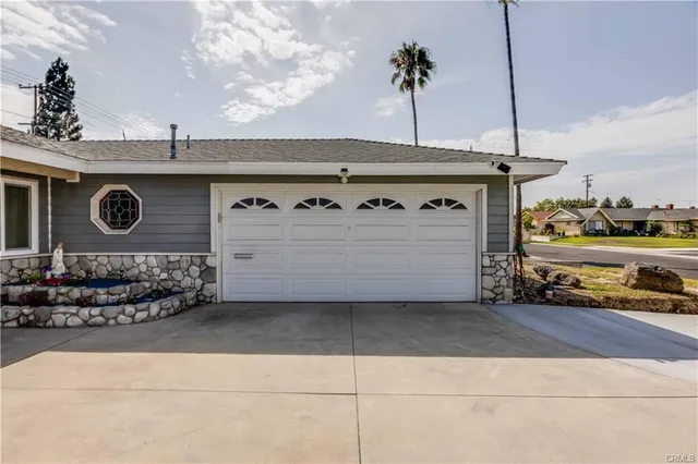 a stove top oven sitting inside of a kitchen