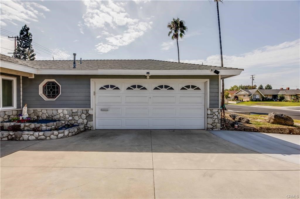 10664 Morning Glory Avenue Fountain Valley, CA 92708 - Photo 3 of 31 a stove top oven sitting inside of a kitchen