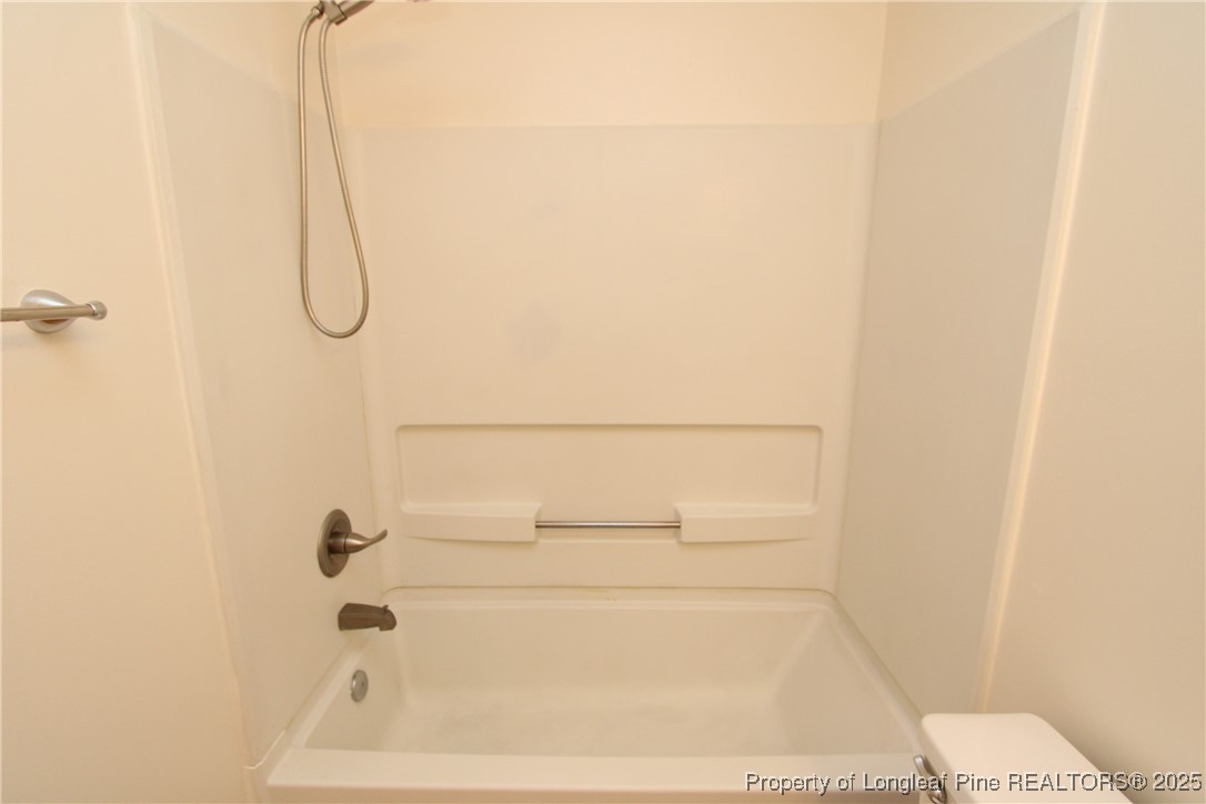 6124 Deerwood Place Raleigh, NC 27607 - Photo 18 of 22 a bathroom with a shower