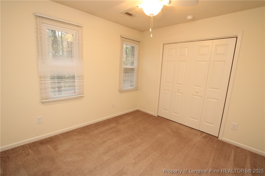 6124 Deerwood Place Raleigh, NC 27607 - Photo 19 of 22 an empty room with windows
