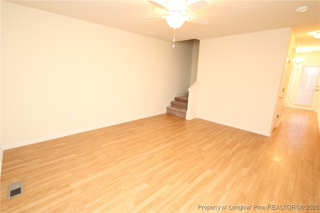 6124 Deerwood Place Raleigh, NC 27607 - Photo 2 of 22 a view of a big room with an entryway
