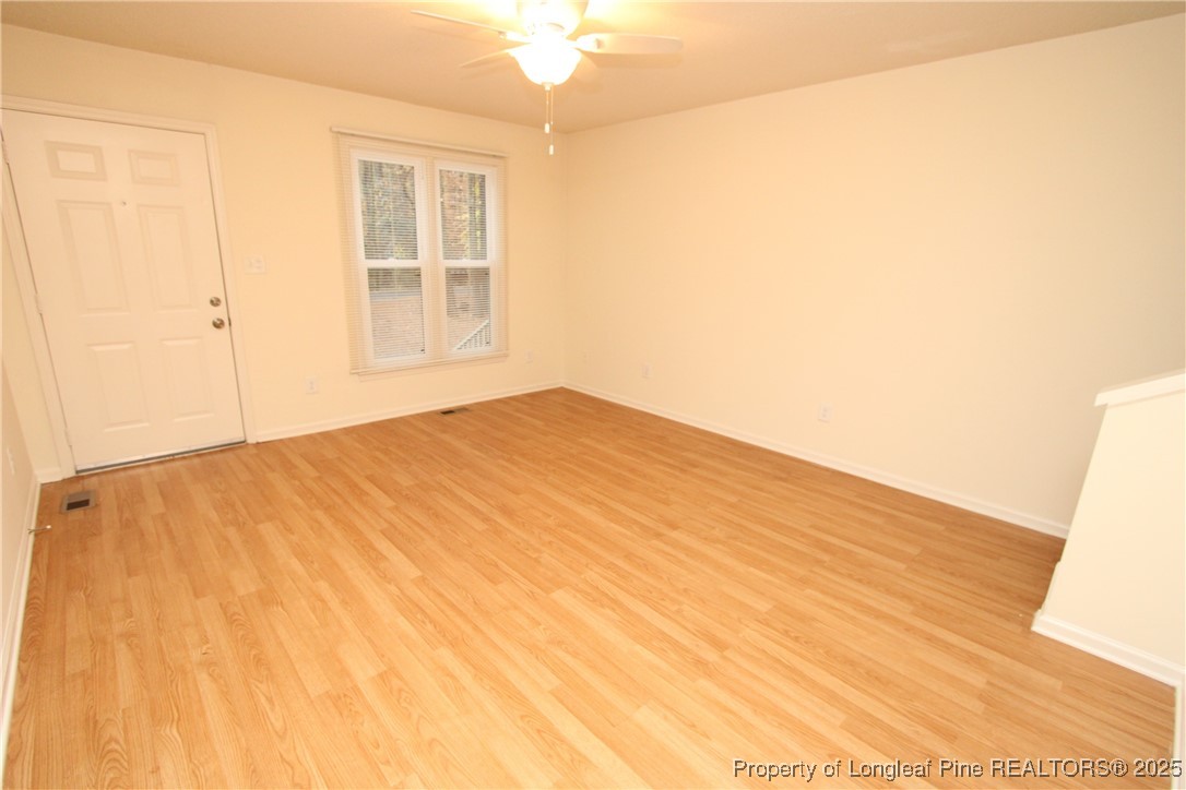 6124 Deerwood Place Raleigh, NC 27607 - Photo 5 of 22 a view of an empty room