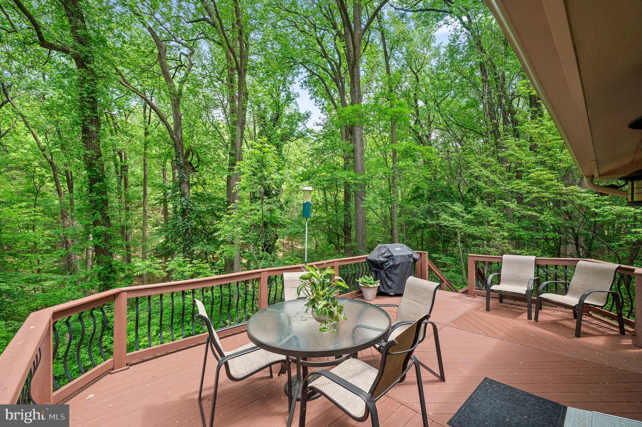 590 Fletcher Road Wayne, PA 19087 - Photo 20 of 44 a view of a balcony with a table and chairs