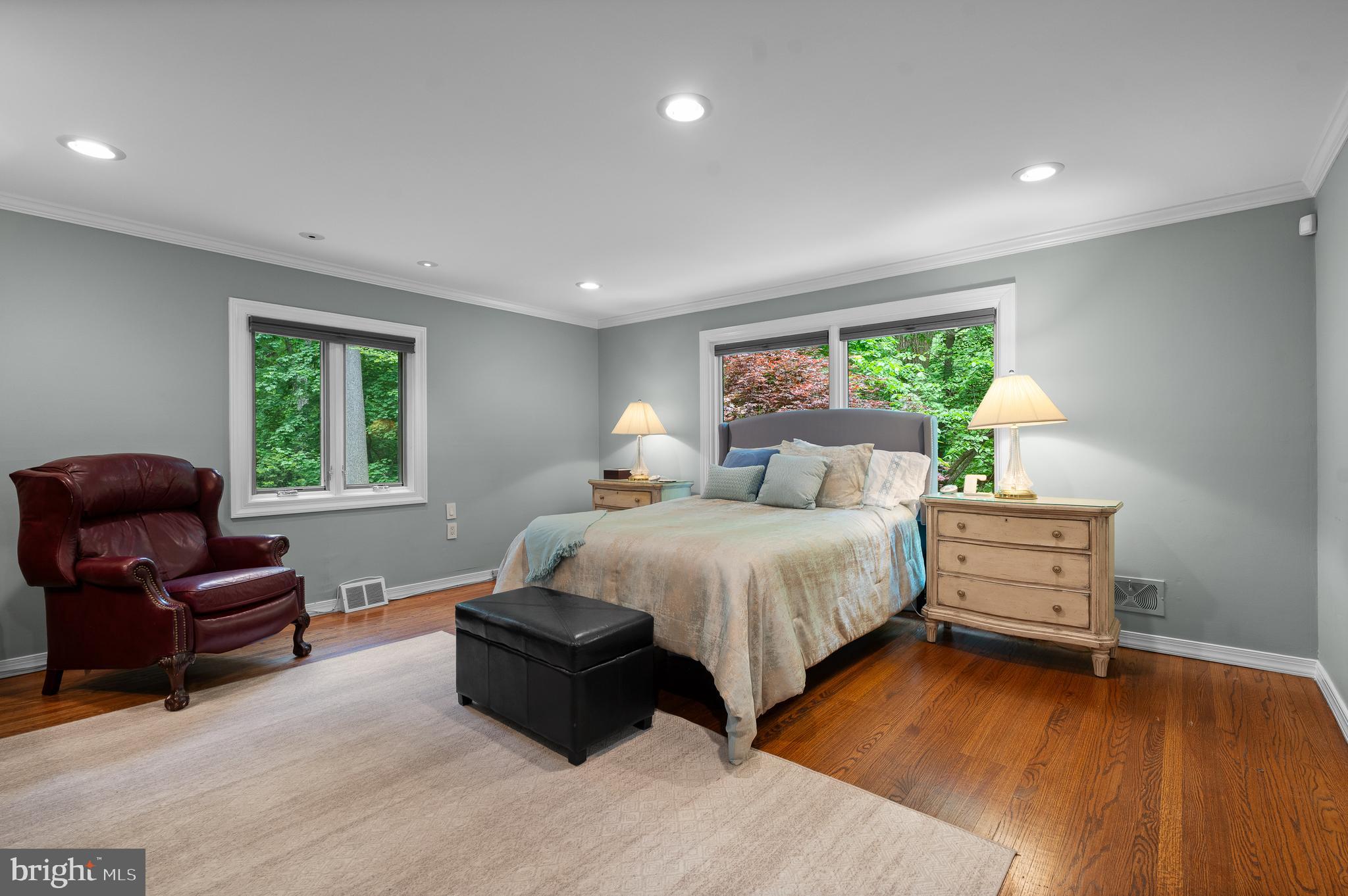 590 Fletcher Road Wayne, PA 19087 - Photo 23 of 44 a bedroom with a bed and a couch