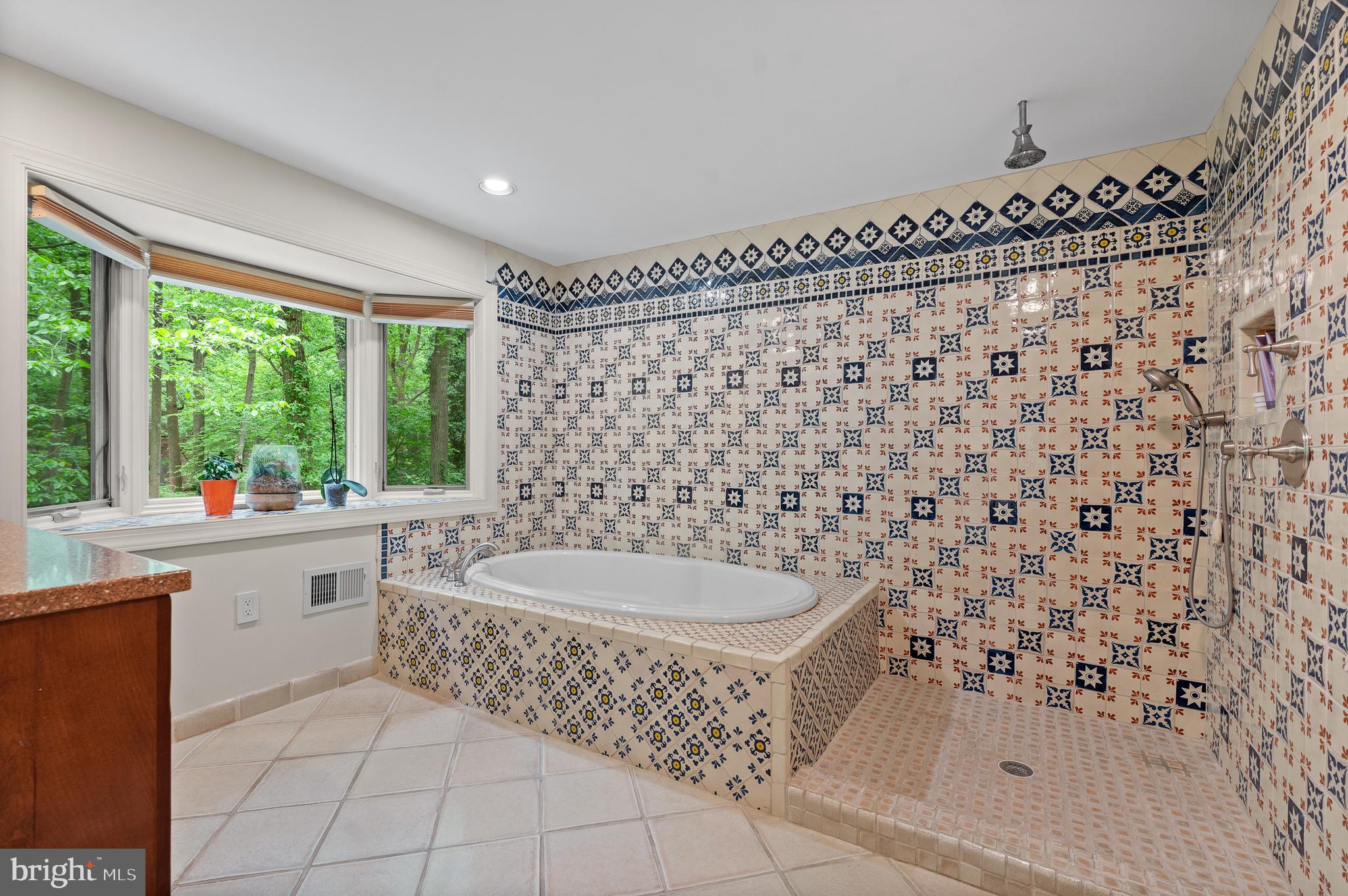 590 Fletcher Road Wayne, PA 19087 - Photo 25 of 44 a bathroom with a bathtub and a sink