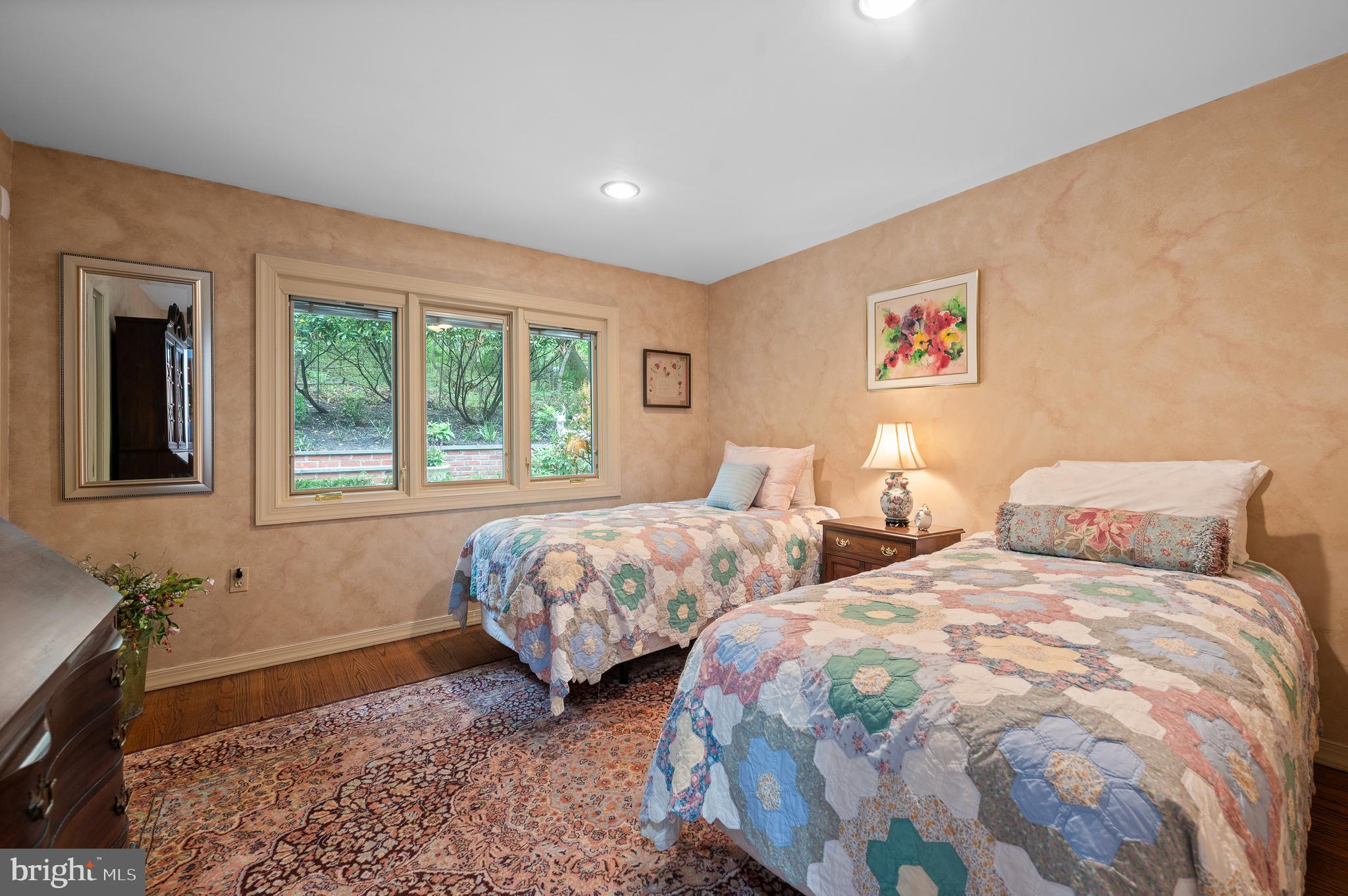 590 Fletcher Road Wayne, PA 19087 - Photo 26 of 44 a bedroom with two beds and a window